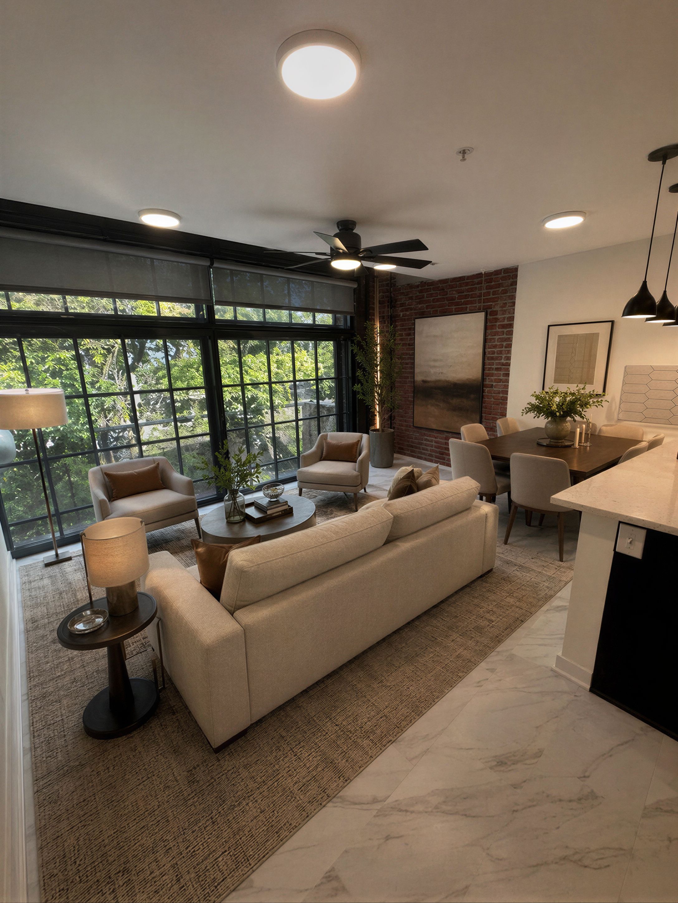 1-bedroom living area with floor-to-ceiling factory windows and warm natural light at The Power House luxury apartments