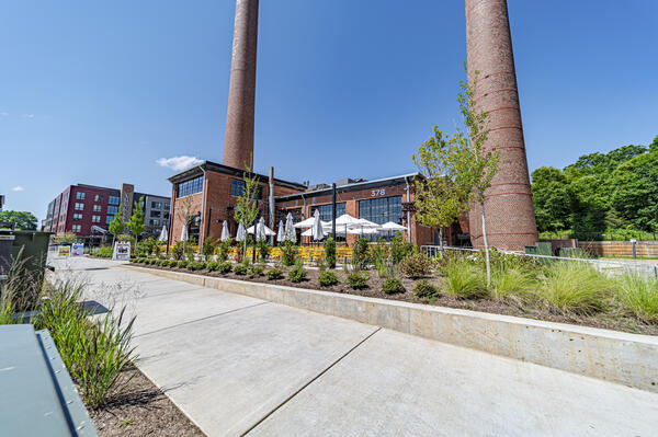 Daytime exterior view of The Power House — a converted 1920s power plant now luxury apartments in Rock Hill, SC